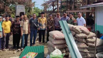 Pj Bupati Ahmadliyah SH, Serahkan Bantuan Korban Kebakaran Komunitas WhatsApp Group Radio 99.50 Djaya FM